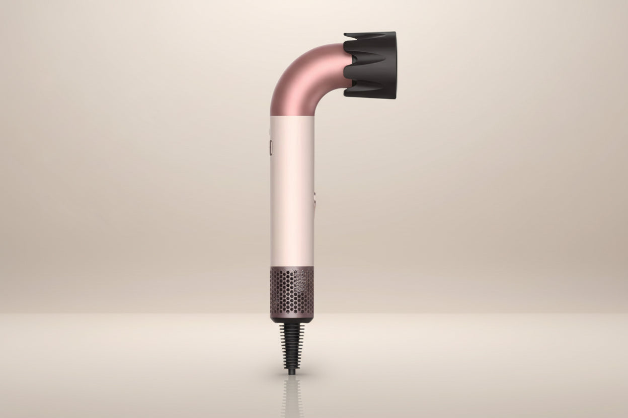 Hair dryer with a nozzle attachment on a white background