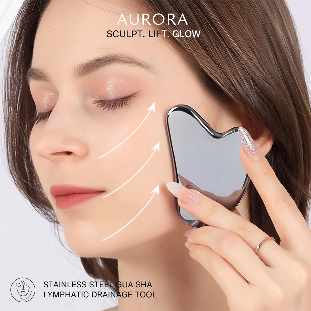 Woman using a black facial tool on her face with a white background