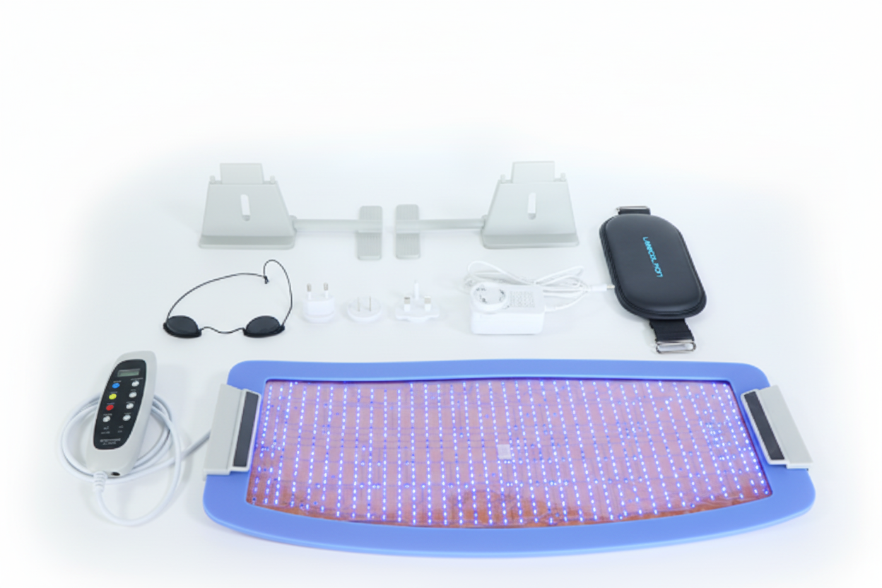 Electromagnetic therapy device with control panel, cables, and accessories on a white background